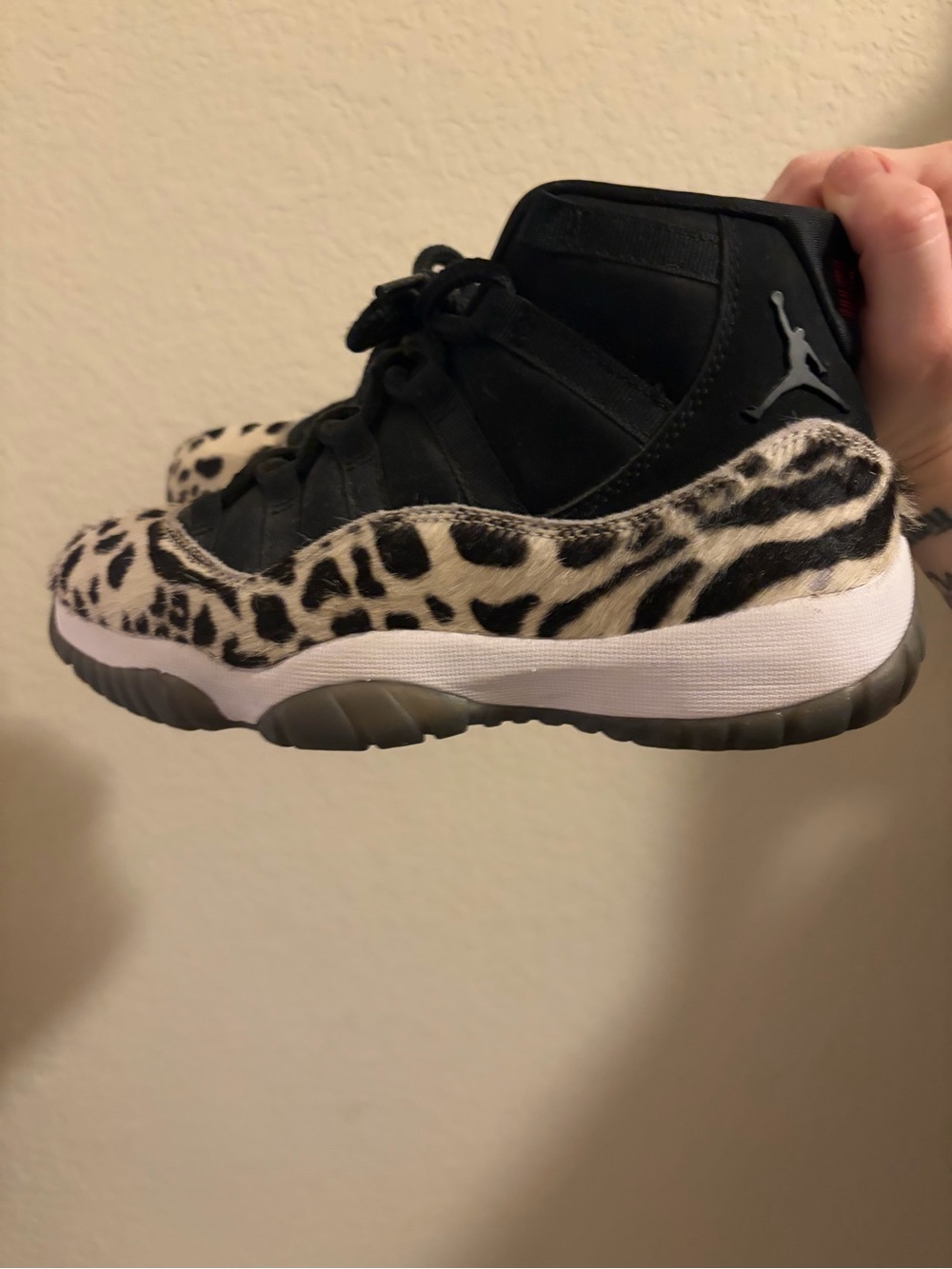 Jordan Woman’s Black & White Animal Print 11 Retro Shoes